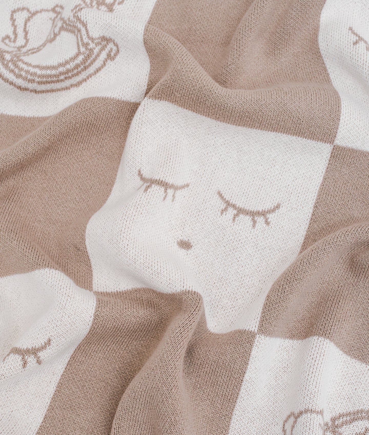 Schaukelpferd-Strickdecke