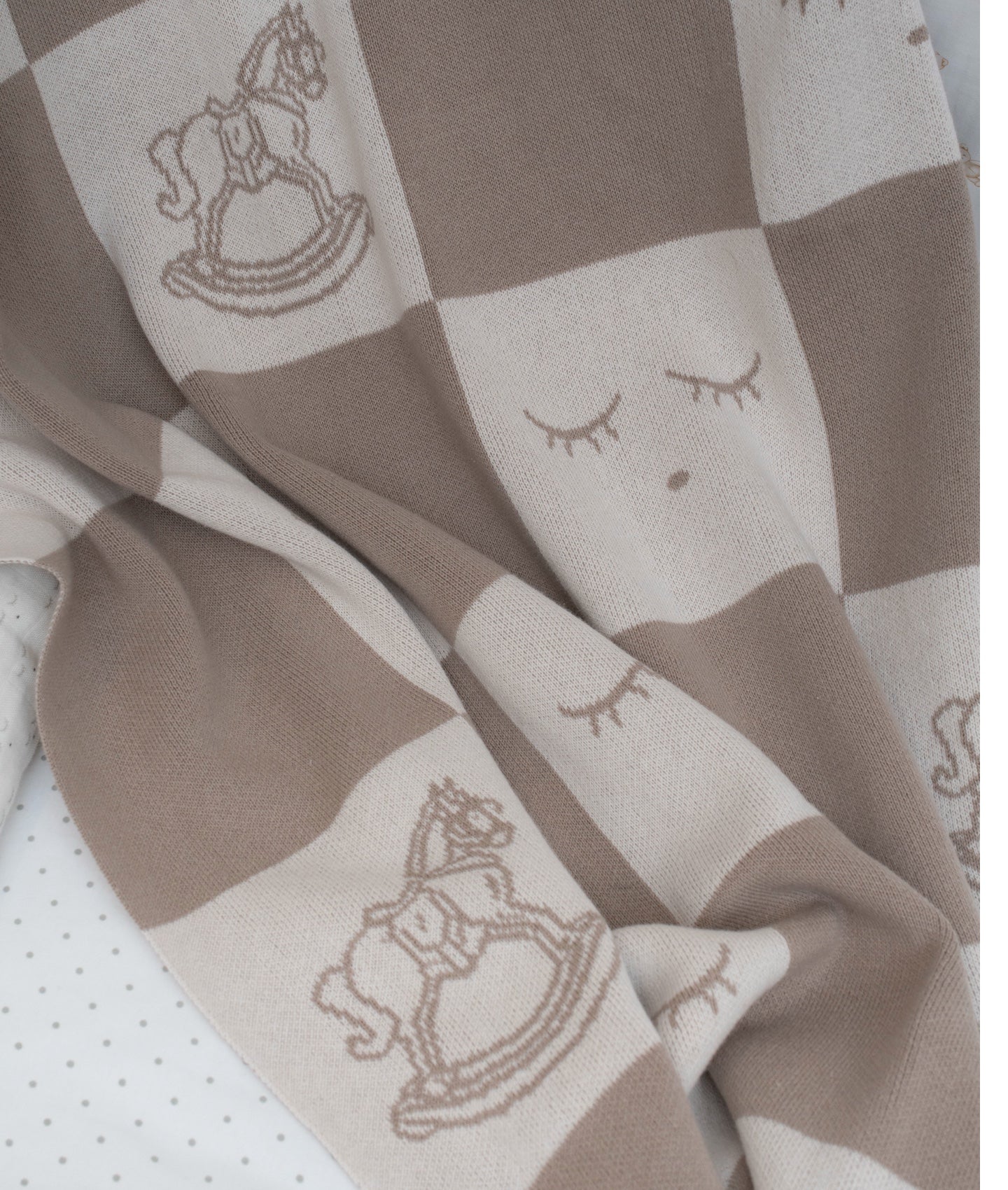 Schaukelpferd-Strickdecke